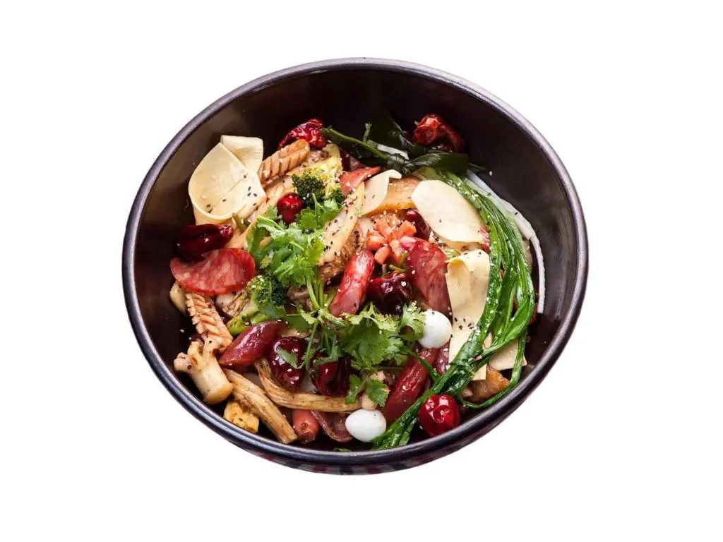 Spicy stir - fried dry pot with assorted ingredients (sausages, vegetables, etc.) at Sushi Naru Pho, a Asian Fusion Restaurant in Charlotte